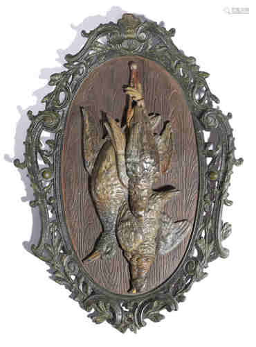 An Austrian cold painted bronze dead game wall plaque, modelled with three birds, including a