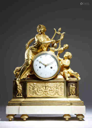 An Empire ormolu mantel clock by de Verberie, the eight day twin train brass cased drum movement,