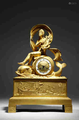 An Empire ormolu mantel clock, the eight day brass drum cased movement, with an outside countwheel