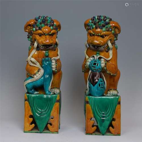 PAIR OF CHINESE PROCELAIN SANCAI LIONS