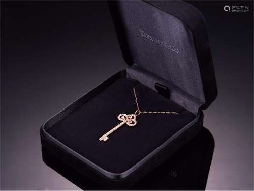 PIAGET 18K ROSE GOLD DIAMOND KEY PENDANT