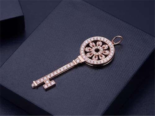 TIFFANY 18K ROSE GOLD DIAMOND SUNFLOWER KEY PENDANT