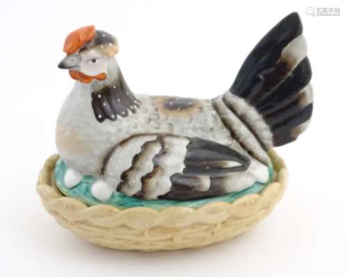 A 19thC Staffordshire hen on nest tureen with light brown basket, approx.
