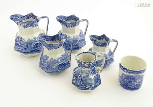 Four blue and white graduated octagonal baluster jugs by Copeland,