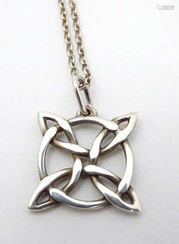 A hallmarked silver pendant with silver chain.