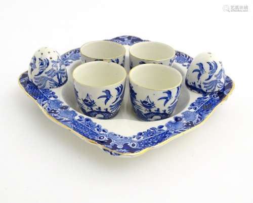 A blue and white Burleigh Ware egg cruet set to include four egg cups,