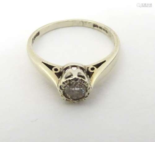 A 9ct white gold diamond solitaire ring CONDITION: Please Note - we do not make