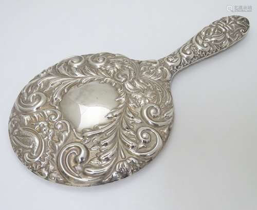 A silver hand mirror hallmarked Birmingham 1969 9 1/4