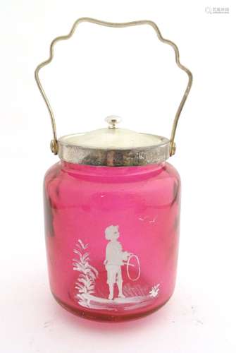 A cranberry glass biscuit barrel with Mary Gregory style decoration and silver plate top and lid.