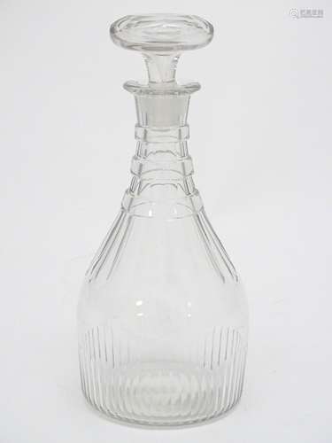 A 19thC decanter and stopper with slice cut decoration 10 1/4