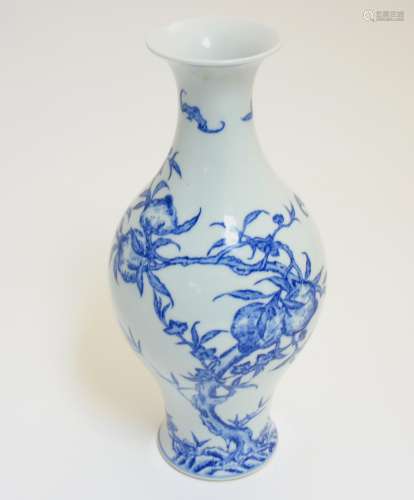 A Chinese blue and white 'Bat and Fruit' vase,