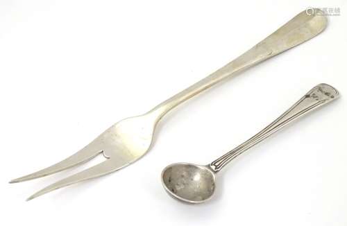 A Dutch silver two tine fork together with a silver thread pattern mustard spoon hallmarked London