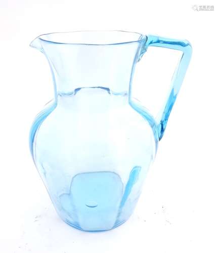 A Turquoise blue glass jug 7