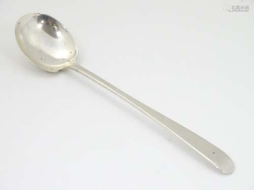 A silver preserve spoon hallmarked Chester 1922 maker Barker Brothers.