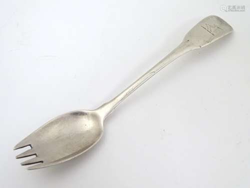 An Irish silver runcible spoon hallmarked Dublin 1821 maker James Scott.