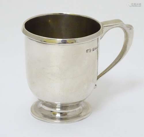 A silver Christening mug hallmarked Birmingham 1919 maker Levi & Salaman 2 3/4