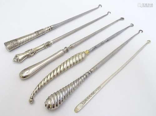 6 assorted button hooks with silver plate handles .