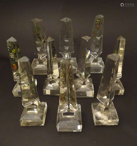 Glass prisms / Obelisks : Ten Victorian glass triangular prisms on square bases with hand painted