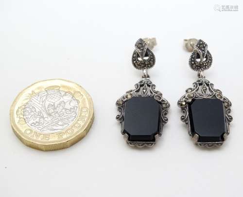 A pair of silver drop earrings set with onyx and marcasite detail 1 1/2