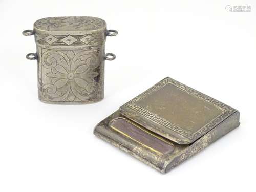 A silver plate match box case with Greek Key decoration together with a white metal container /