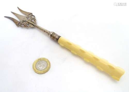 A silver bread fork with ivory handle hallmarked Sheffield 1911 maker Walker & Hall 8 1/4