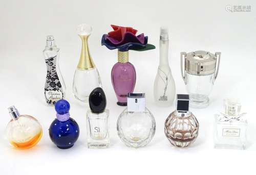 Quantity of Scent bottles : a box containing 11 scent bottle including , Lola , Sí, Invictus etc.