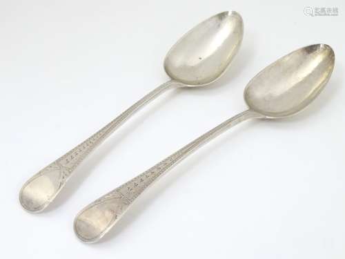 Two table spoons having bright cut decoration.