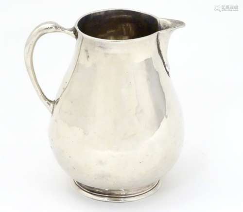 A Geo I Britannia Standard silver Sparrow beak jug hallmarked London 1721 3 1/2