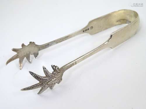 Silver ice tongs with birds claw grips hallmarked Sheffield 1897 maker William Hutton & Sons Ltd.