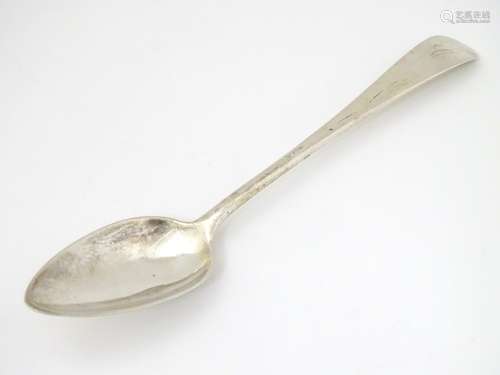 A Scottish silver dessert spoon hallmarked Edinburgh 1802 maker James Orr of Greenock.