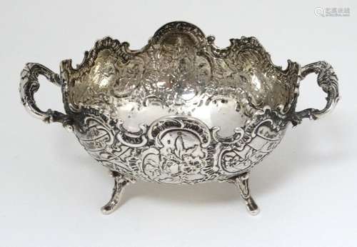 A Continental white metal twin handled dish, indistinctly marked under.