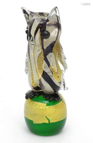 Art Glass : A studio glass model of an eared owl on stand, signed ' M Merrl (?) ' under,