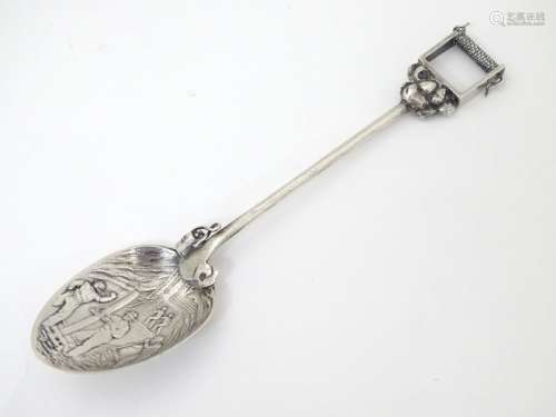 American Mining Souvenir spoon : A silver spoon having die cast decoration to bowl depicting