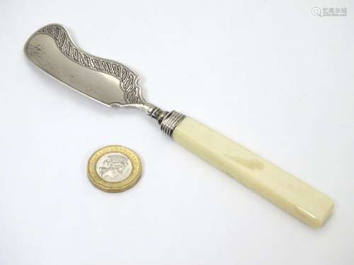 A silver butter knife hallmarked Birmingham 1822 maker Joseph Willmore 6 1/2