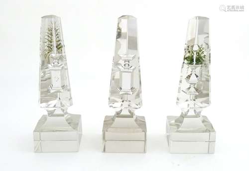 Glass prisms / obelisks : Three Victorian glass triangular prisms on square bases with hand