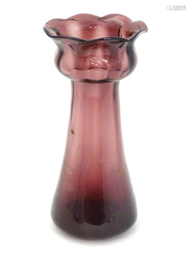 Hyacinth vase : an unusual purple glasses , petal topped circa 1900 Hyacinth vase ,