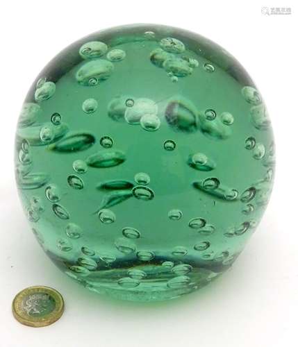 Victorian Glass : An Aqua ' Dump ' weight ( often used as a door stop ) with air inclusions ,