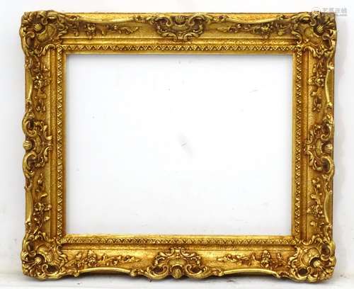 Gilt Picture frame : an ornate late 20thC ( in the Victorian Style ) aged gilt over gesso and wood