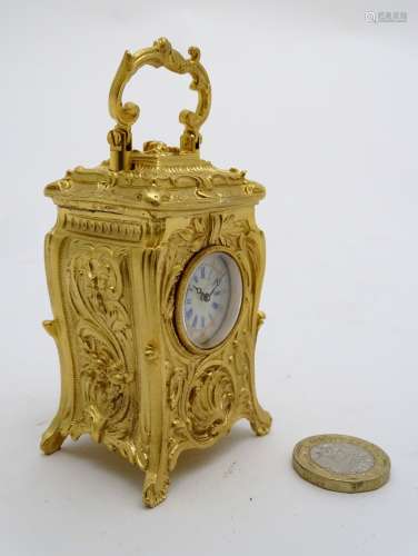 Miniature Carriage Clock : A 21stC gilded Rococo style miniature carriage clock ( timepiece ) ,