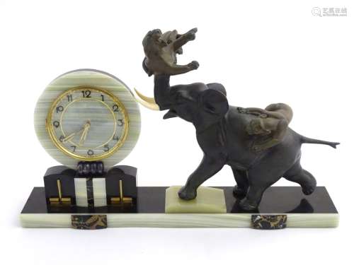 Art Deco Clock : an Irenee Rochard (1906-1984) signed tiger and elephant sculptural clock with