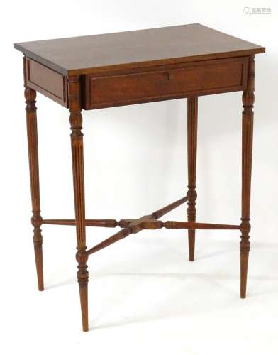 A 20thC hardwood hall table with rectangular top above single short drawer with moulded sides,