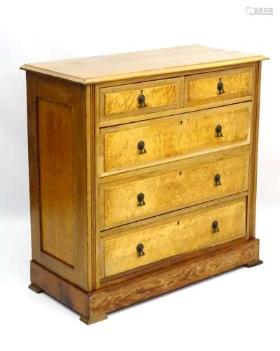 A Victorian walnut and birds eye maple chest of drawers with two short over three long drawers,