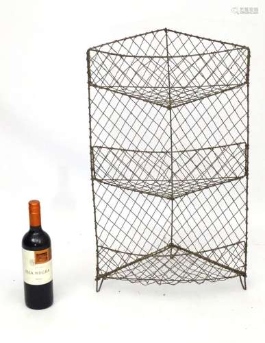 Veg - Rack : a three tier wirework corner vegetable rack measuring 26” high.