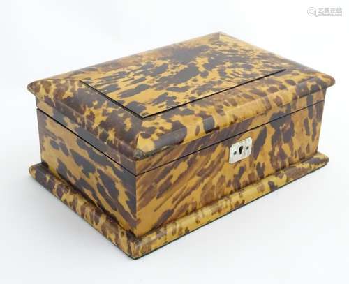 A 19thC blonde tortoiseshell hinged box with wooden lining.