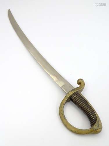 Militaria: A novelty paperknife formed as a 19thC naval cutlass, of brass and steel construction.