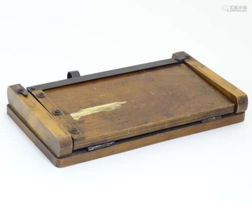 A Merrett's Patent sprung oak and steel paper guillotine 1 1/2