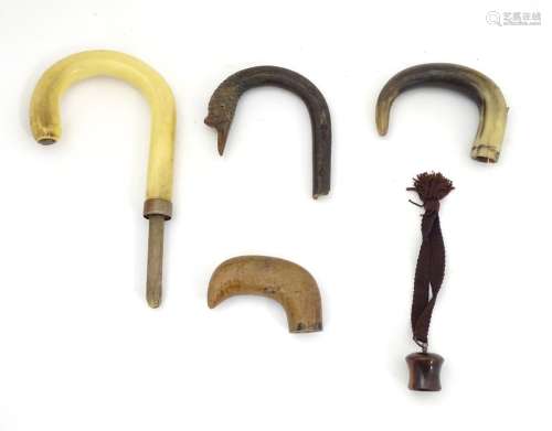 5 assorted cane / parasol handles to include carved wood, horn ,