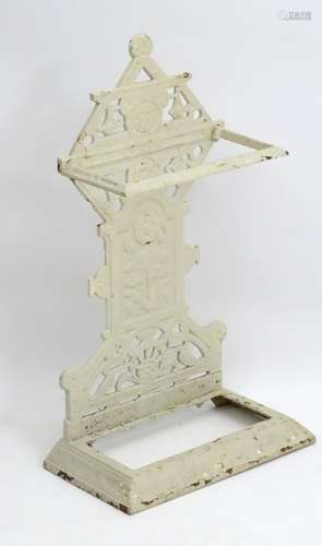 Victorian cast iron stick stand : an 1892 white painted Coalbrookdale type stick stand of 2 parts