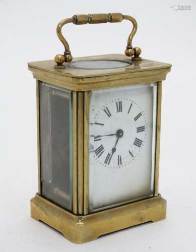 A.C.C.L. : A brass cased 5-glass carriage clock (timepiece) with bevelled glass.