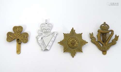 Militaria: four 20thC British army cap badges of Irish regiments, comprising the Connaught Rangers,